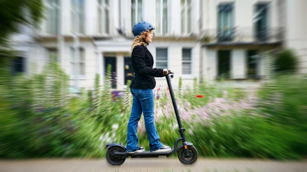 A child on an e-scooter highlighting the need for better Road Safety Awareness in neighborhoods.